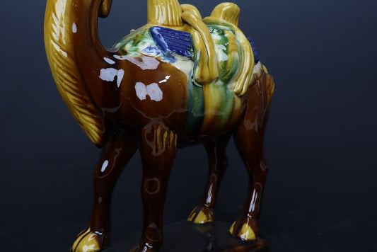 Vintage Sancai Camel Ornament: Exquisitely crafted, it revives the charm of the Tang Dynasty. With gorgeous colors and vivid shape, it's perfect for decoration and collection, adding an artistic touch and cultural atmosphere to your home. Don't miss it!