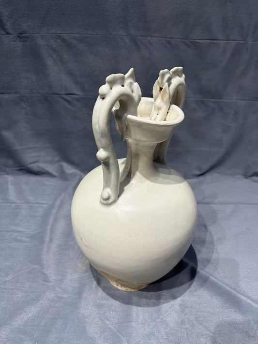 Collectors' must - have! This white porcelain vase with double - dragon - shaped handles, crafted by traditional techniques, is rare and full of ancient charm, perfect for your home.