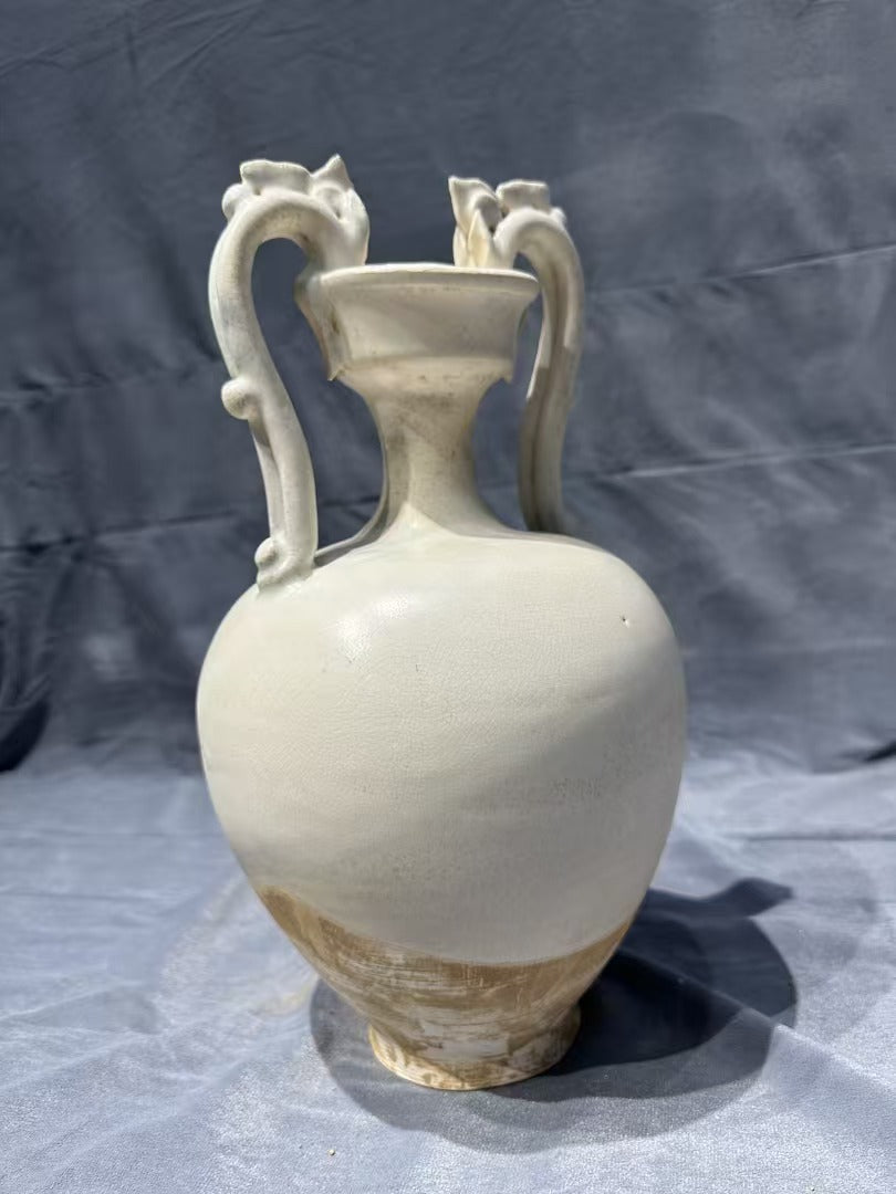 Collectors' must - have! This white porcelain vase with double - dragon - shaped handles, crafted by traditional techniques, is rare and full of ancient charm, perfect for your home.