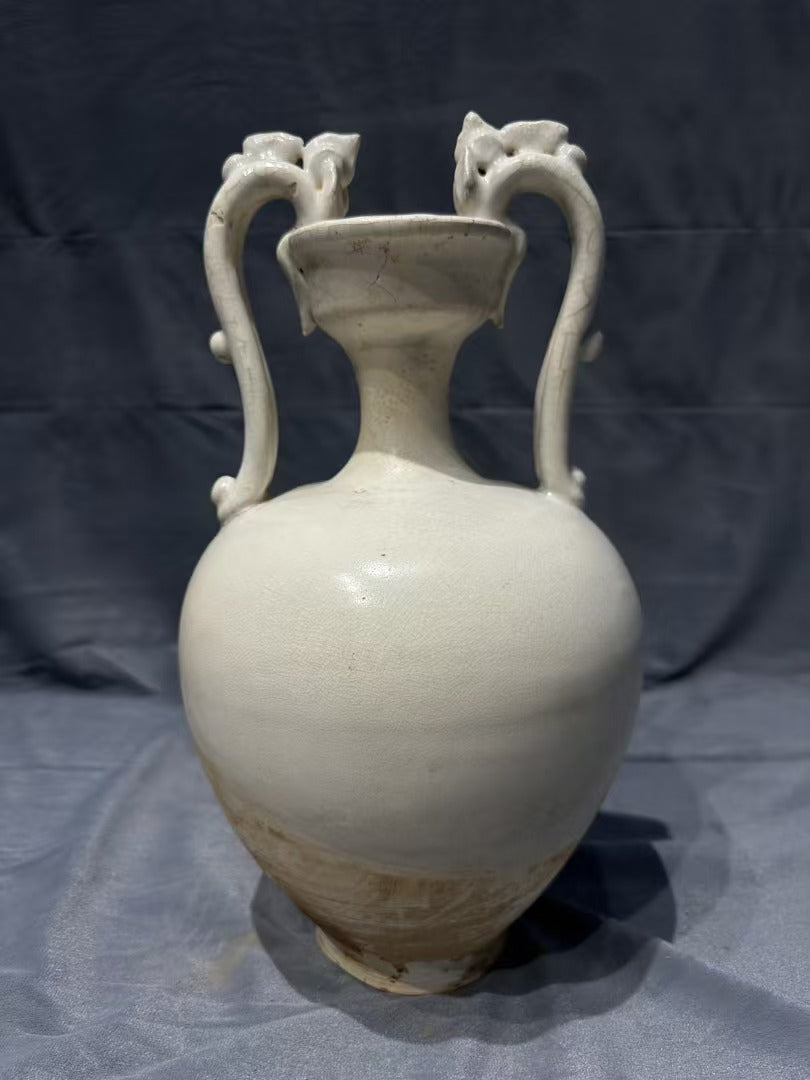 Collectors' must - have! This white porcelain vase with double - dragon - shaped handles, crafted by traditional techniques, is rare and full of ancient charm, perfect for your home.